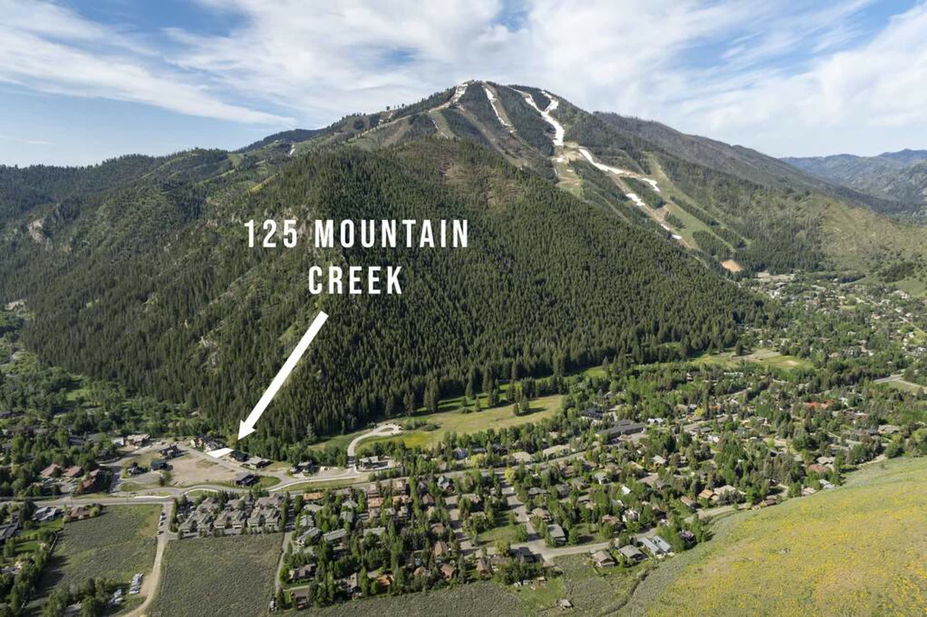Aerial view over Ketchum toward Bald Mountain with the homesite located at the base of the Warm Springs runs