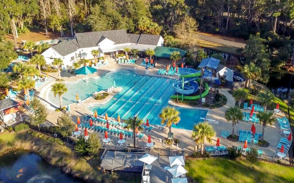 Aerial view of The Landings Franklin Creek pool with water slides, splash pad, and lap lanes